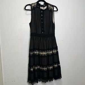 Sleeveless Black Lace Dress for evening.